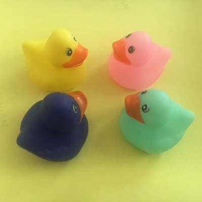 Mini yellow rubber duck baby bath toy with 2 inch capsule