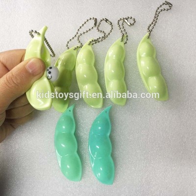 Wholesale new style Emoji squeeze magic bean fidget toy,adult squeeze bean toy keychain