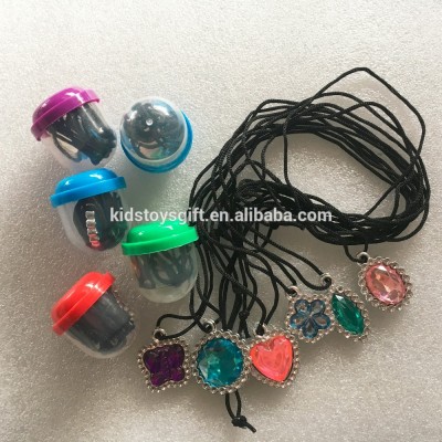 Cheaper 1.1" vending machine empty capsule with assortment diamond necklace